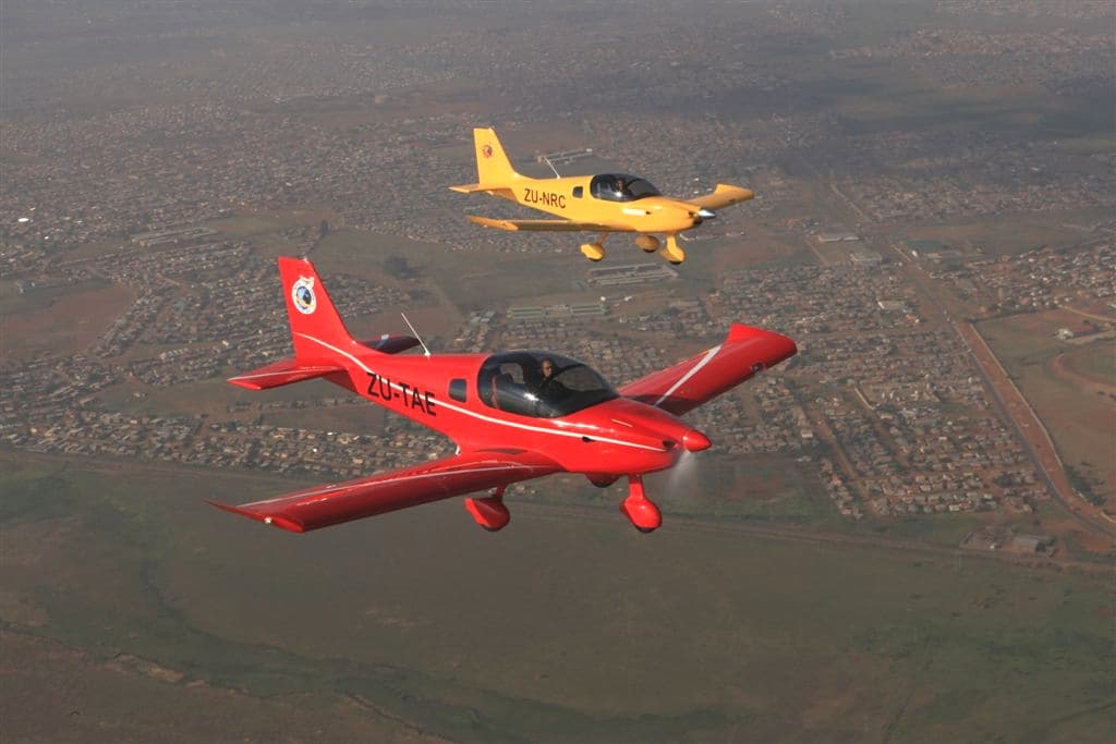 Two Sling 2 light aircraft flying in formation